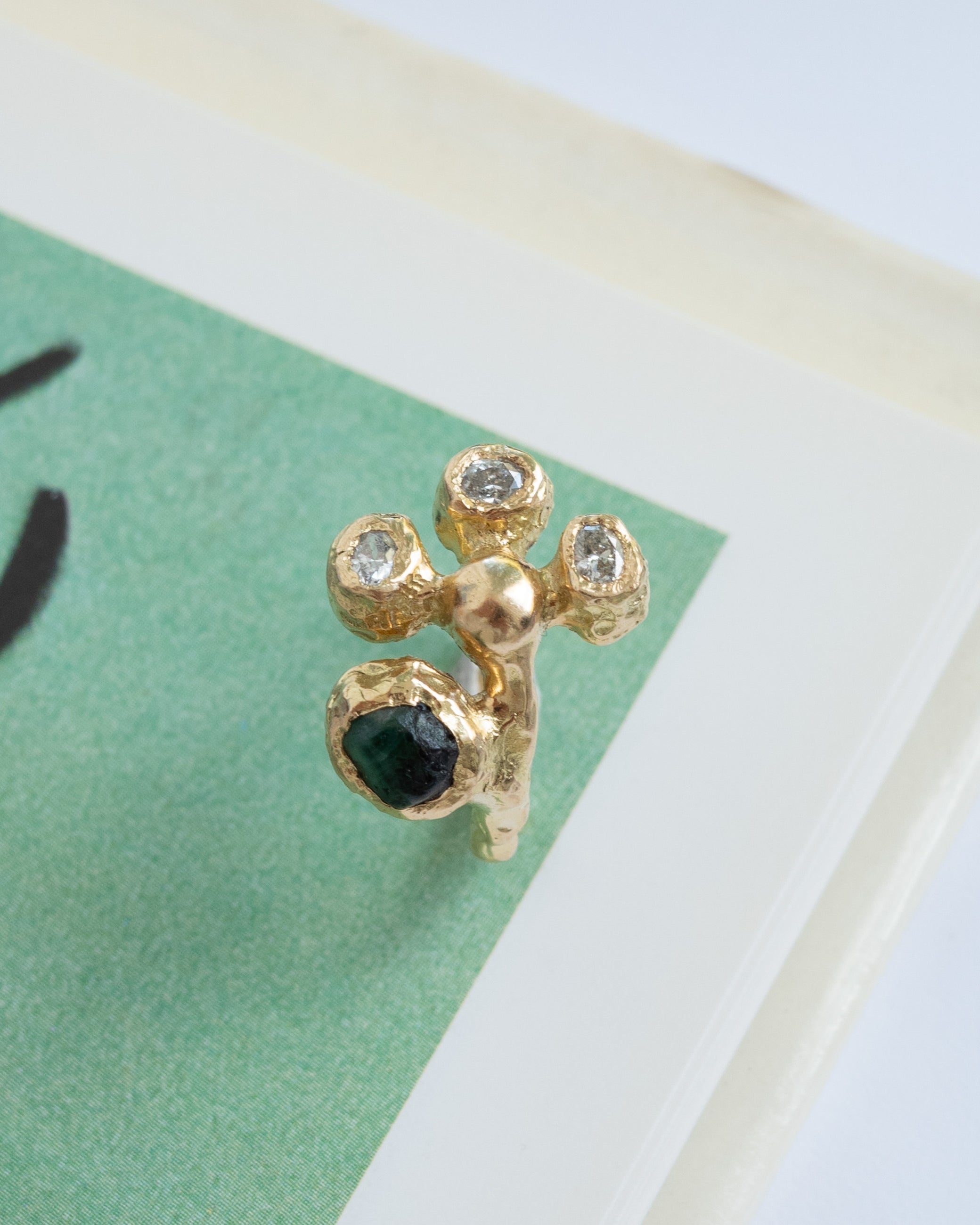 anemone with diamonds and emerald