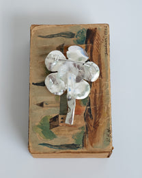 flower brooch with peridot