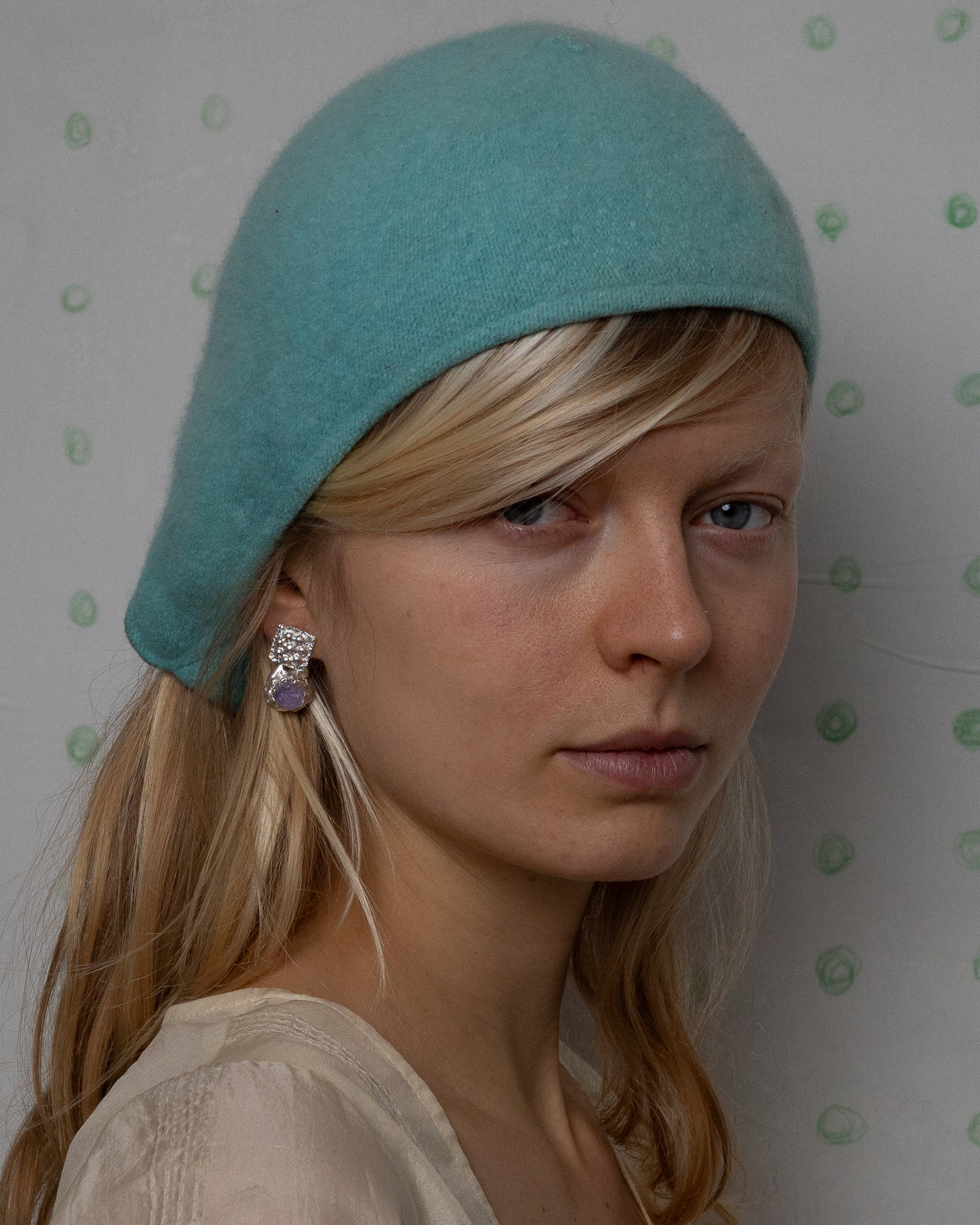 earringed with an amethyst