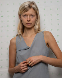 birgits finger with a green emerald and a smoky quartz