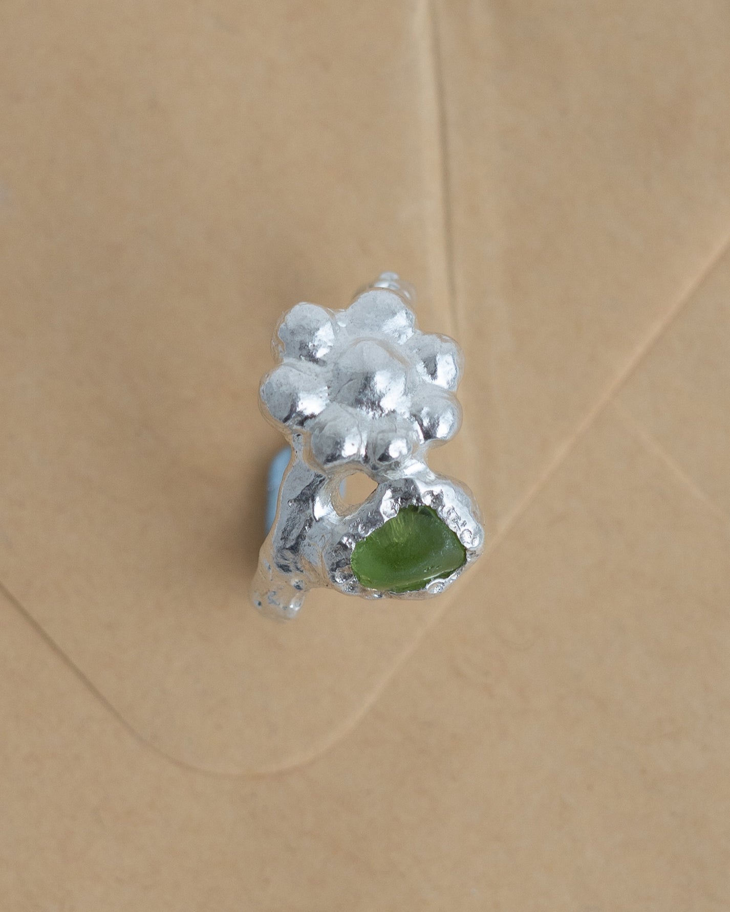 birgits finger in bloom with peridot