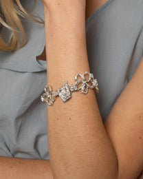 book of flowers with a blue sapphire