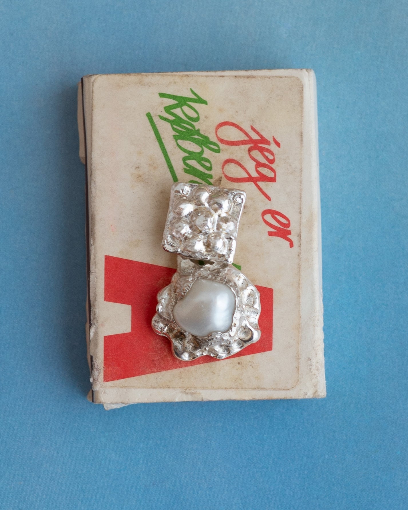 earringed with a mother of pearl