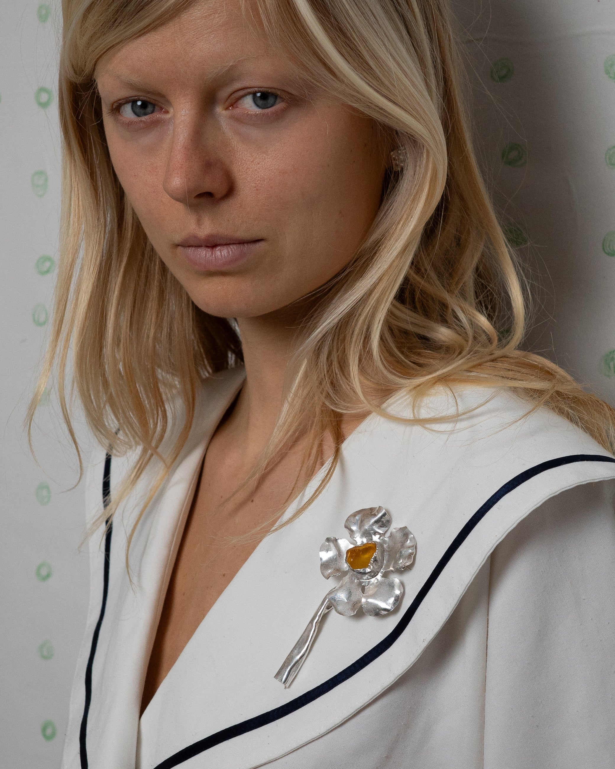 flower broche with amber