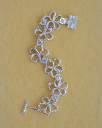 book of flowers with a blue diamond