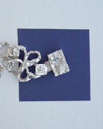 book of flowers with a blue diamond