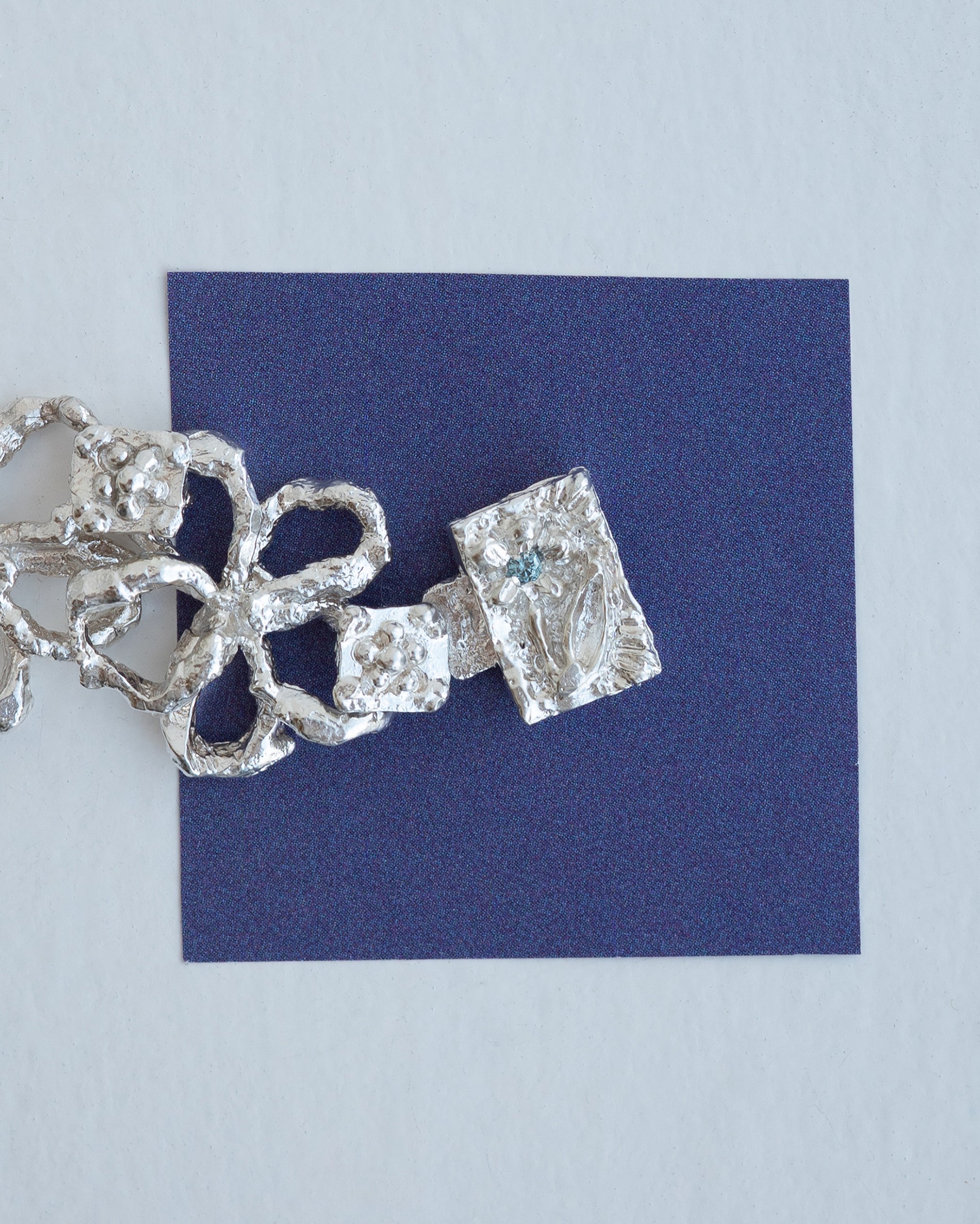 book of flowers with a blue diamond