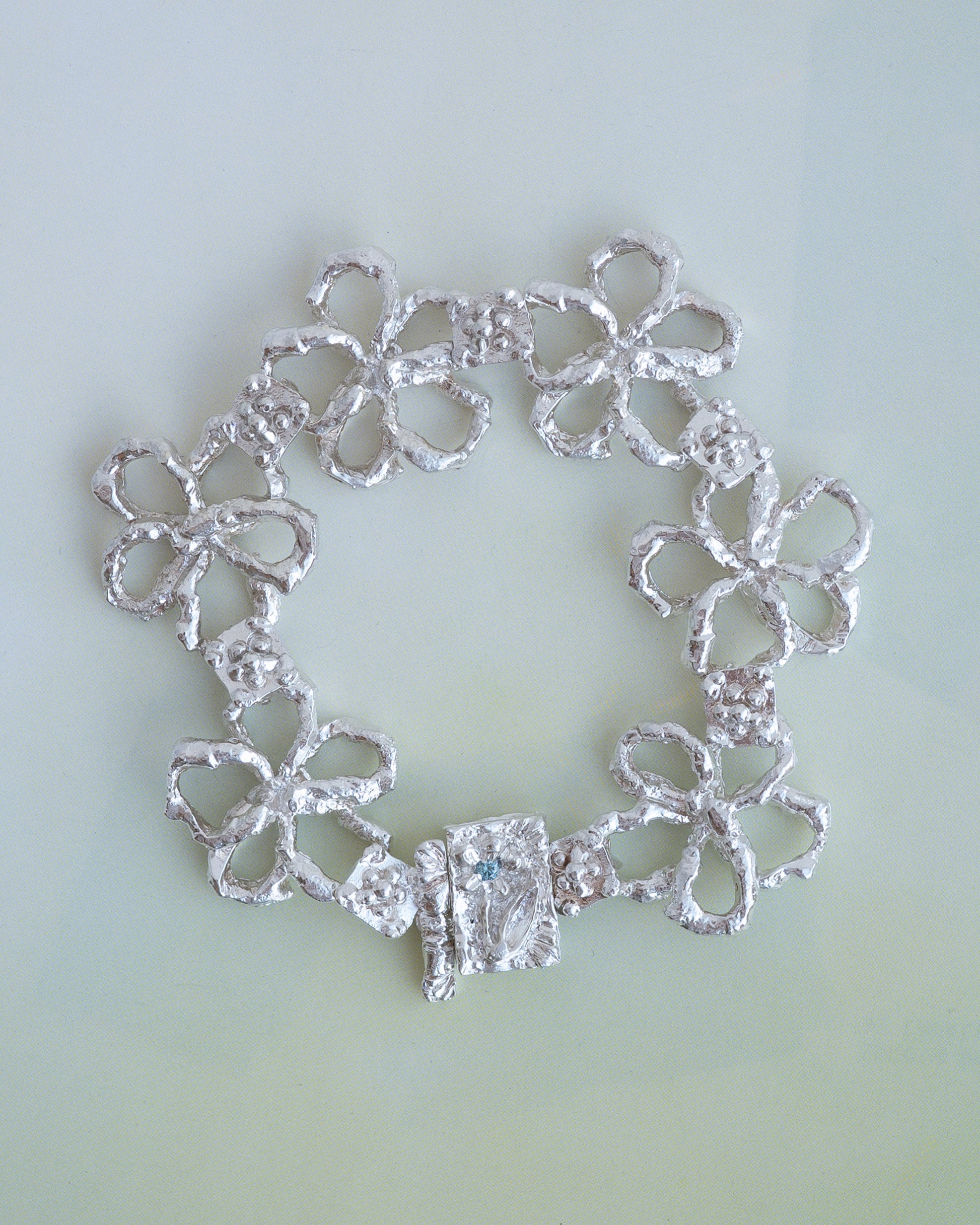 book of flowers with a blue diamond