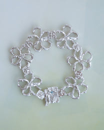 book of flowers with a blue diamond