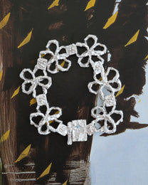 book of flowers with a blue diamond