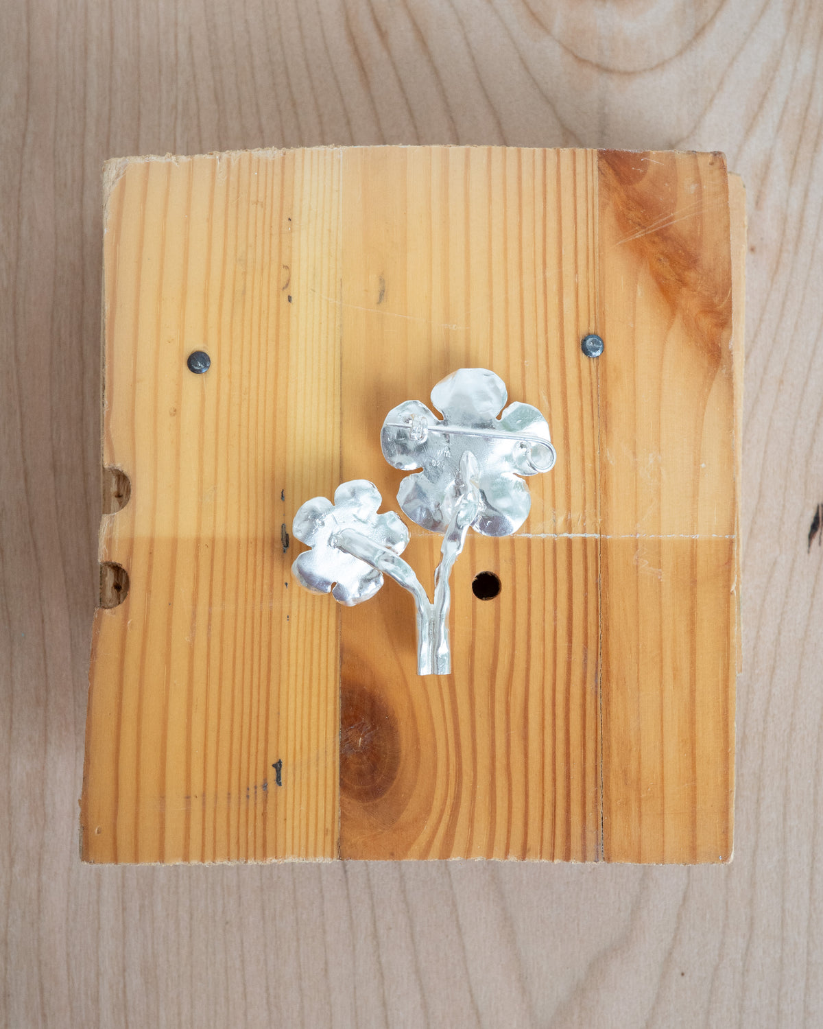 flowers in bloom with peridot and garnet