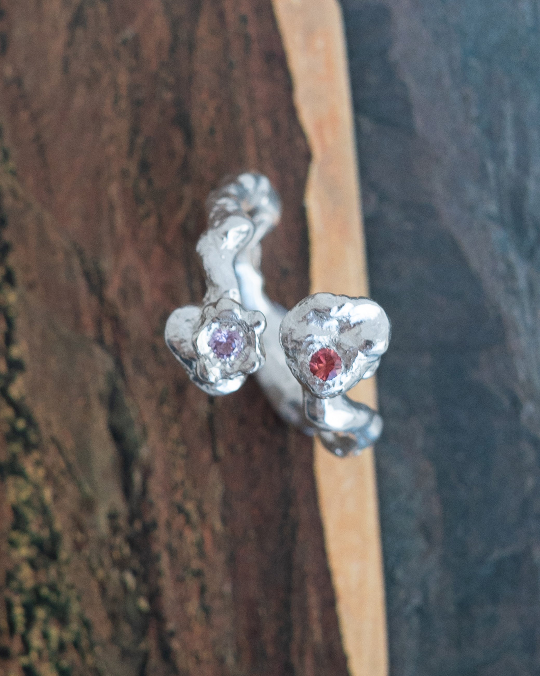 kasper with an orange and pink sapphire