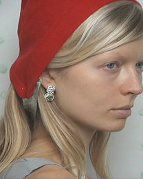 earringed with peridot