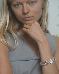 book of flowers with a blue sapphire