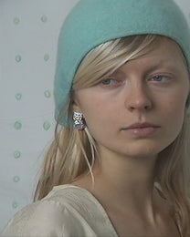 earringed with an amethyst