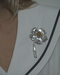 flower broche with amber