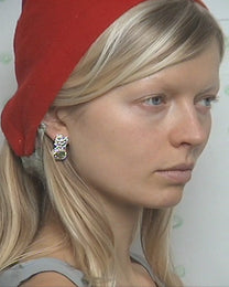 earringed with peridot